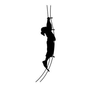 Rope ladder, little girl climbing on rope ladder silhouette
