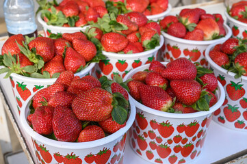 juicy appetizing strawberries at a local market in Cyprus in winter 3