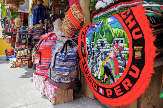 Souvenir shops with colorful Peruvian handmade arts and crafts in Tourist market in downtown Peru, Lima