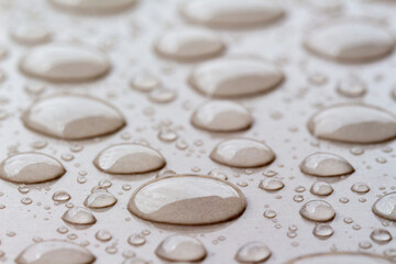 Water drops on granite floor with blur background