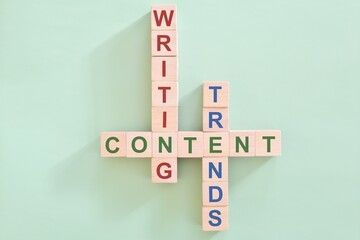 Content writing trends concept. Crossword puzzle flat lay typography in green background.	
