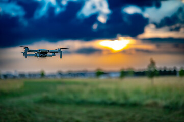 Drone hovering above the skyline as dusk approaches. 