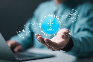 AI ethics or AI law concept. Businessman use laptop with virtual ai ethics icon for compliance,...
