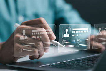 Businessman use laptop to checking resume for employee recruitment. Screening employee information...