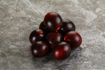 Raw ripe black kumato tomato