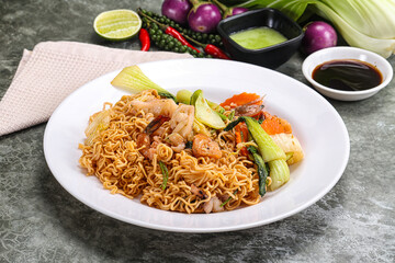 Asian cuisine - Fried noodles with seafood