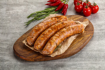 Raw sausages with spices and herbs