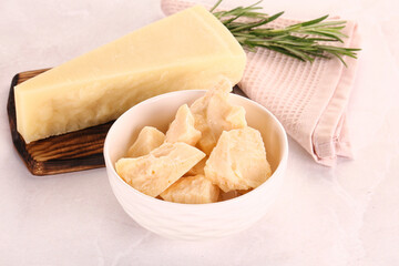 Chopped Italian hard parmesan cheese