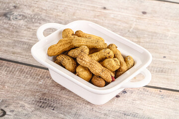 Raw ripe unpeeled peanut heap