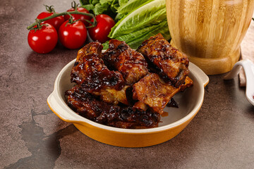 Grilled pork ribs in barbecue sauce