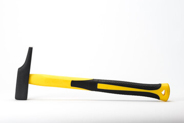 Hammer with yellow handle on white background.