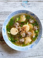 Delicious Thai Soup pork tofu with Vegetables in a Gourmet Bowl, a Healthy and Flavorful Dinner or Lunch Option