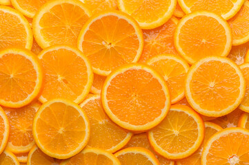 oranges cut into slices and laid out on the table as a food background 3