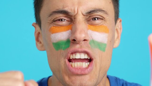 Close up of a man supporting indian team
