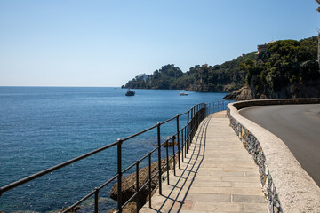 Fototapeta na wymiar Portofino pedestian access pathway to Santa Margherita Ligure in sea coast Italy in summer day