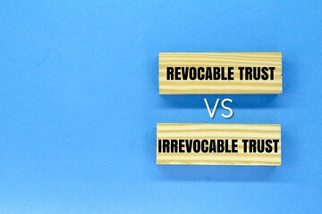wooden arrangement with the words Irrevocable Trust vs Revocable Trust