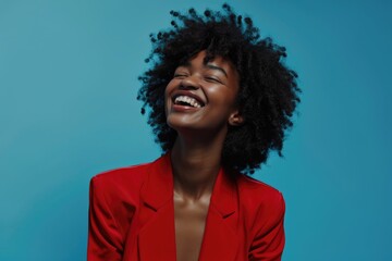 Fototapeta na wymiar Smiling African American woman sending message on blue background