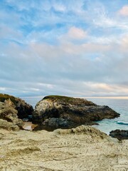 Cloudy ocean view, rocky ocean coast, ocean bay