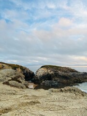 Cloudy ocean view, rocky ocean coast, ocean bay