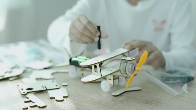 Asian children and toys, educational technology, engineering and STEM education concept