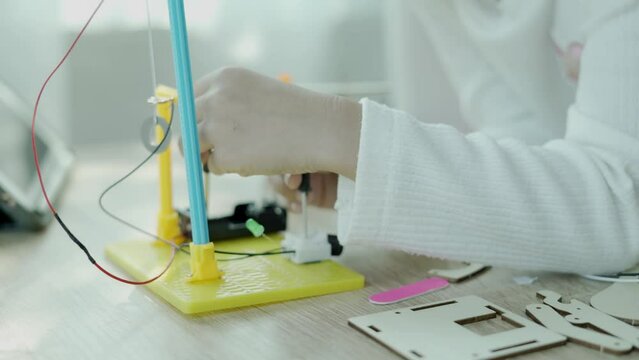Asian children and toys, educational technology, engineering and STEM education concept