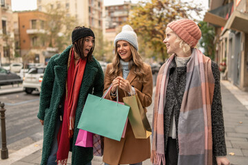Female Friends Enjoying an Autumn Shopping Day in the City