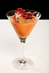 Spanish cuisine. Gazpacho with Spanish ham