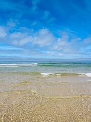 Transparent sea water, beautiful azure sea coast, sand beach, natural blue sea background