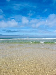Transparent sea water, beautiful azure sea coast, sand beach, natural blue sea background