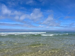Transparent sea water, beautiful azure sea coast, sand beach, natural blue sea background