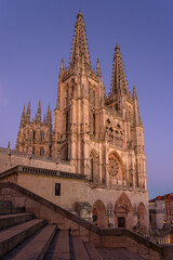 Obraz premium Gothic cathedral facade of the city of Burgos at night in a suuny day. Castilla y Leon, Spain.