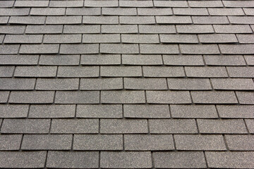 Close up of new rubber roof tiles with gray color