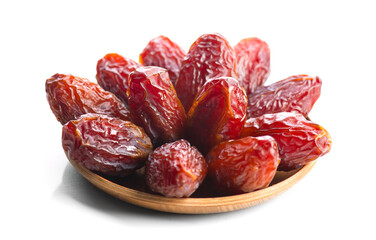 Dates fruit. Date fruits in wooden bowl isolated on white background. Heap of Organic Medjool dates close up. Vegan food