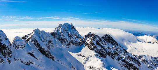 snow covered Tatra mountains in winter - obrazy, fototapety, plakaty