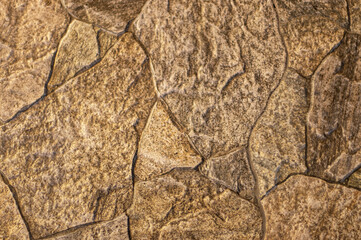stone wall texture and brown color background blur show natural  texture 