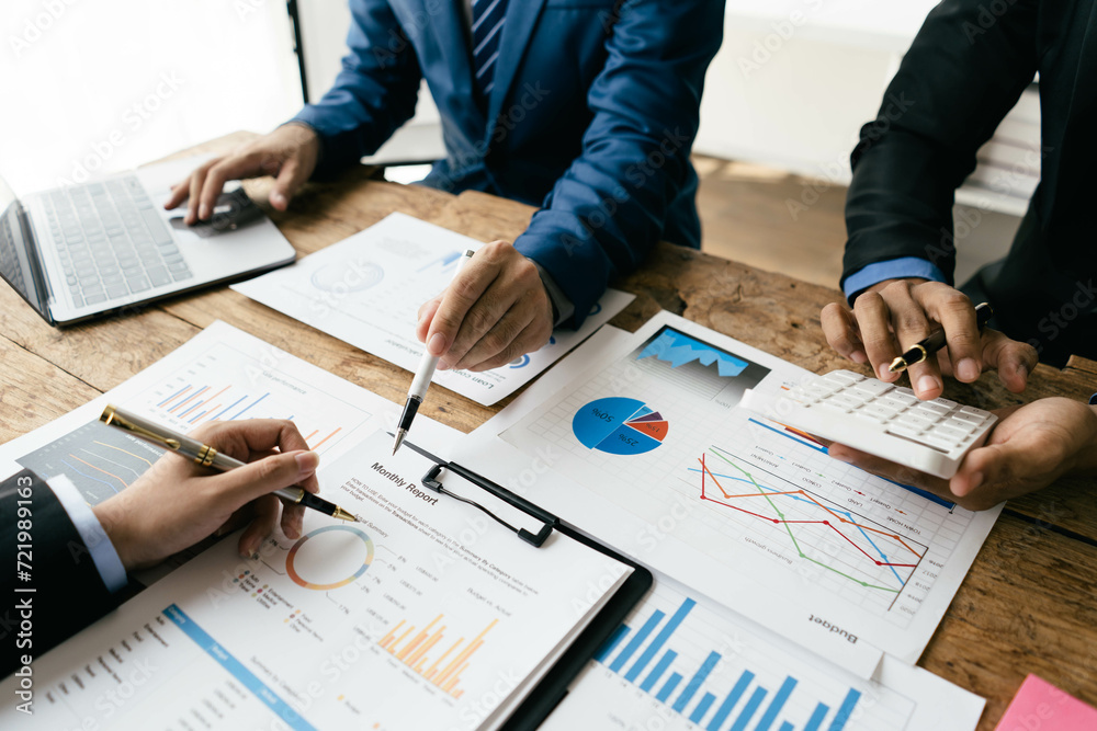 Aufkleber business people or accountant using calculator while working analytical business report on the workp