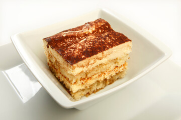 piece of cake on a plate. Tiramisu