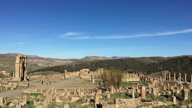 High-angle footage of tourists in the ancient Roman town of Djemila. Setif, Algeria. UNESCO World Heritage Site.
