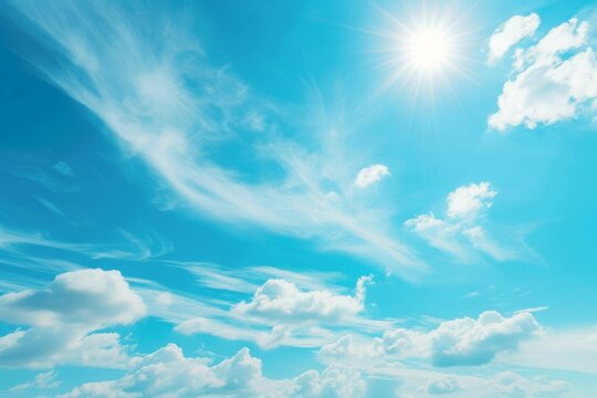 Blue sky with white clouds and bright sun