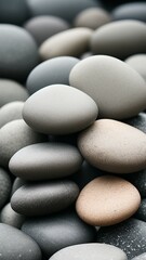 Fototapeta na wymiar A pile of smooth sea rocks on a gray surface. Stone background. Sea pebbles on the ground. Generated AI.