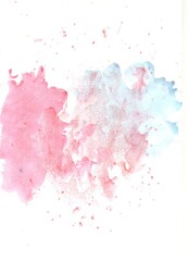 Pink and blue watercolor paint stains on white papper 