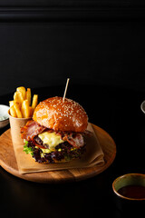 One tasty burger with cheese and bacon - 722032535