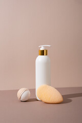 white cosmetic jar bath foam  and washcloth