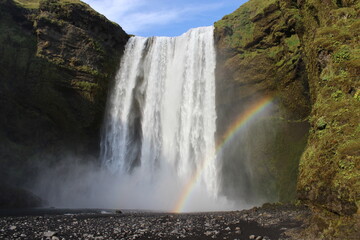 iceland waterfall great big green rainbow