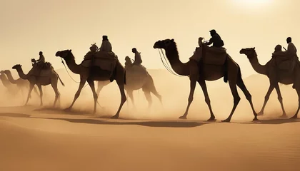 Rolgordijnen side view of silhouettes of camels and their owners moving in single file in a sandstorm in the desert  © abu