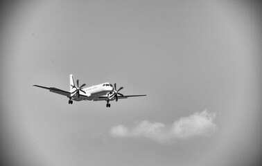 Biplane plane with propellers landing