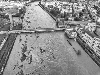 Aerial view of the Arno river during flood, Pisa, Italy - 722052993
