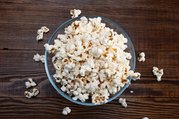 Salted popcorn in glass bowl