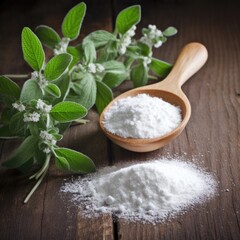  Powdered sugar in a wooden spoon, with fresh stevia leaves, on a wooden background