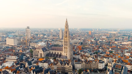 Fototapeta na wymiar Antwerp, Belgium. Panorama overlooking the Cathedral of Our Lady (Antwerp). Historical center of Antwerp. City is located on the river Scheldt (Escaut). Summer morning, Aerial View